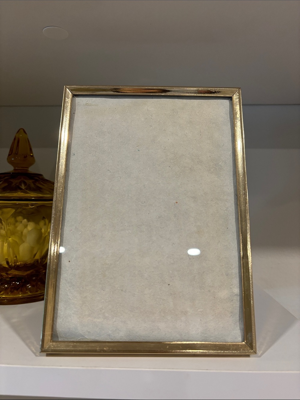 Gold coloured metal frame